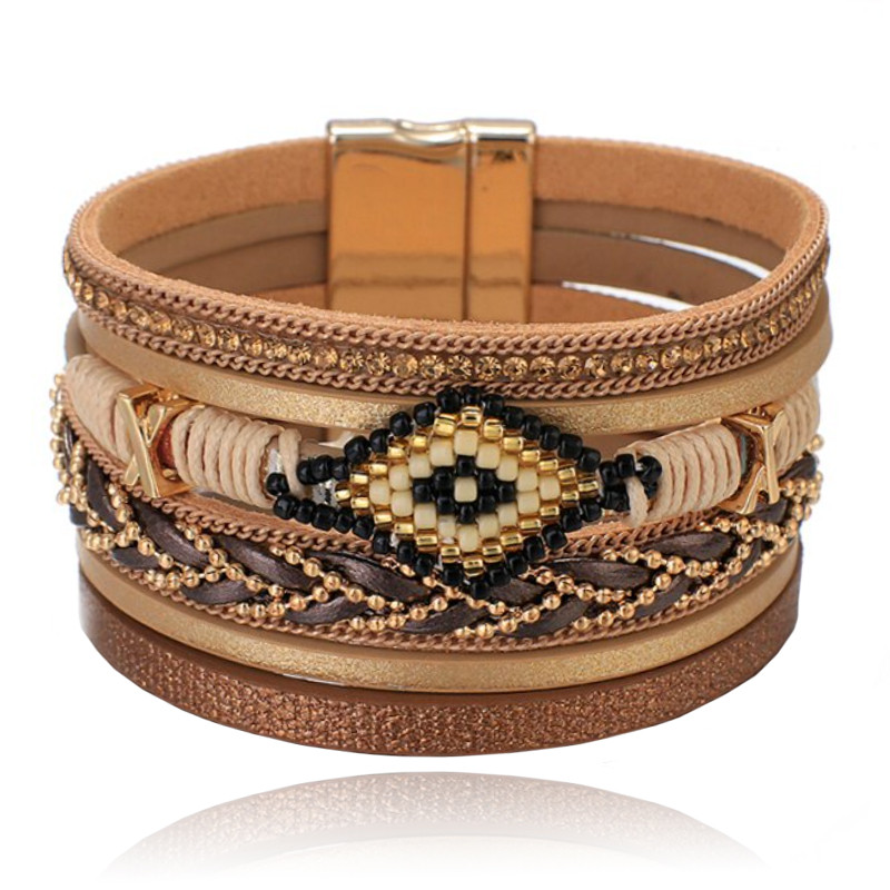 Bruine dames armband met kristal en goudkleurige details