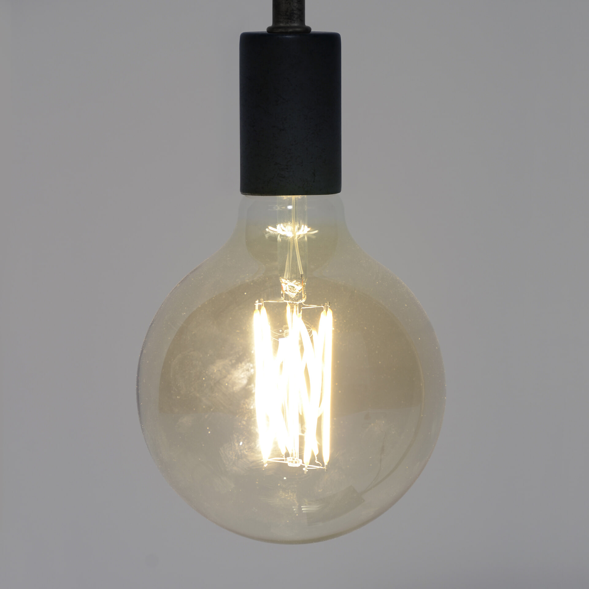 Kooldraadlamp Bol XL Ø12,5cm E27 LED 6W goldline, dimbaar - Amberkleurig glas